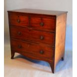 A Victorian Mahogany Straight Front Chest two short and two long drawers with circular brass