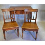 A Victorian Mahogany Side Table With Two Frieze Drawers, raised upon turned tapering legs,