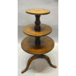 A 19th Century Mahogany Dumb Waiter With A Turned Center Column and tripod supports, 68cm tall