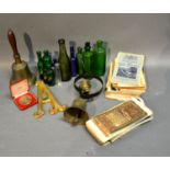 A Collection Of Early Bottles Together With A Hand Bell and other items