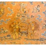 An 18th Century Chinese Silk And Gold Thread Embroidery depicting an elephant carrying a vase