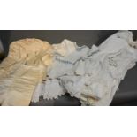 An Early 20th Century Silk Christening Jacket With Pantaloons, together with a large collection of