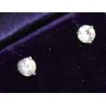 A Pair Of Platinum And Diamond Solitaire Ear Studs approx. 1.04ct