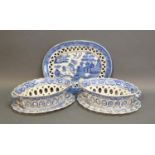 A Pair Of 18th Century Creamware Oval Baskets On Stands of pierced form decorated in under-glazed