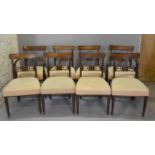 A Set Of Eight Regency Mahogany Dining Chairs, comprising two armchairs and six singles with