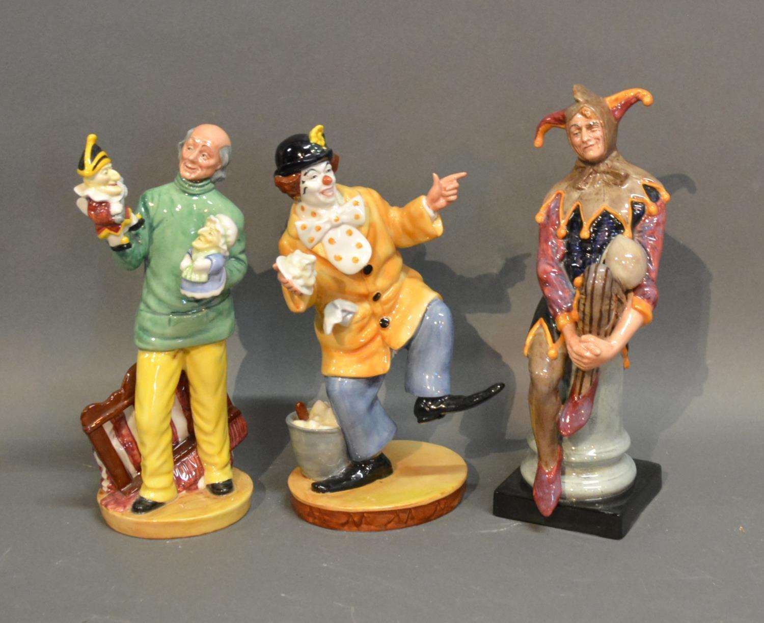 A Royal Doulton Figure The Clown H.N. 2890, together with another similar Royal Doulton figure Punch