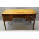 An Edwardian Mahogany Chequer Inlaid Writing Desk with five drawers brass handles, raised upon