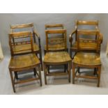 A Set Of Six Regency Elm Country Dining Chairs Comprising a pair of arms with four matching