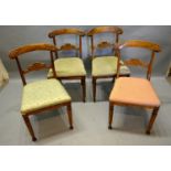 A Set Of Four William IV Mahogany Dining Chairs each with a carved rail back above a drop in seat,