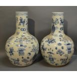 A Pair Of Chinese Porcelain Large Bottle Neck Vases, decorated in under glaze blue, 59cm tall