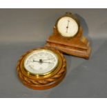 An Early 20th Century Barometer Of Circular Form By Burgis & Colborne Leamington, together with an