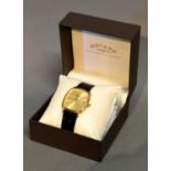 A Rotary Gentlemans Wrist Watch With Leather Strap with original box and papers