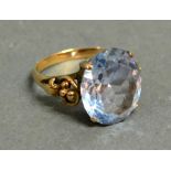 A 14ct. Gold Ring Set With A Large Oval Aquamarine Claw Set