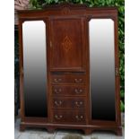 An Edwardian Mahogany Marquetry Inlaid Wardrobe the shaped moulded cornice above a central door