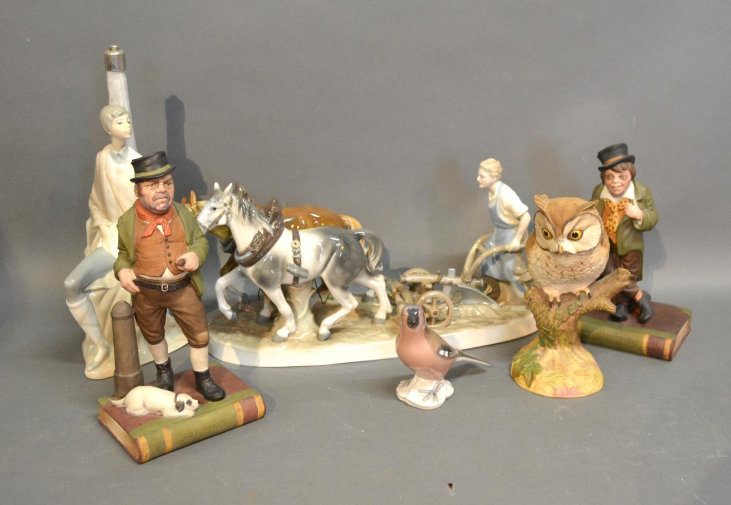 A Pair Of Aynsley Dickensian Bookends, together with a Royal Copenhagen model of a bird and two