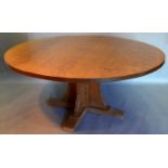 A Robert (Mouseman) Thompson Of Kilburn Large Circular Heavy Oak Dining Table, the adze carved top
