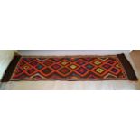 A Kilim Runner With An All Over Design Within Multiple Borders, 239cm by 62cm