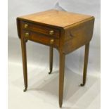 A Regency Mahogany Drop Flap Work Table, the two frieze drawers with brass knob handles, raised upon