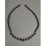 An Amethyst And Pearl Necklace With 9ct. Gold Clasp