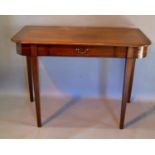 A 19th Century Mahogany Serving Table The Moulded Top above a frieze drawer with brass handles,