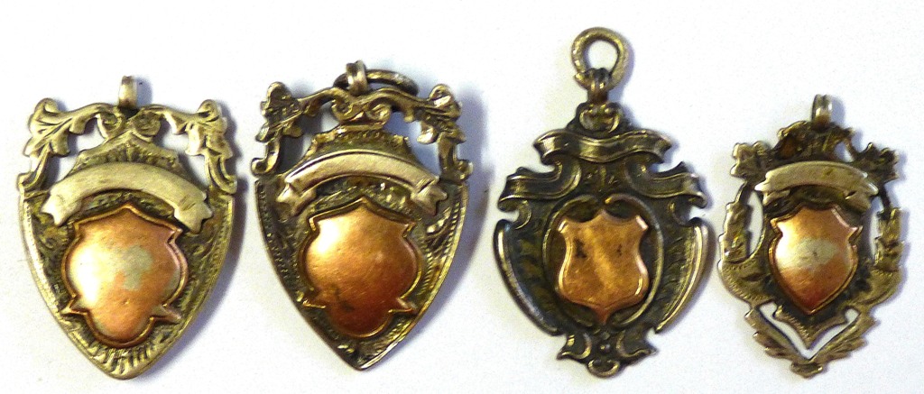 Football Silver and Gilt Medals 1911-1916 N.E.Q.C and G.C. Winners (4)