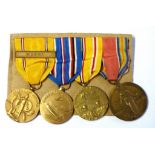 WWII American four place Naval Medal group including: American Defensive (with Fleet Bar) scarce,