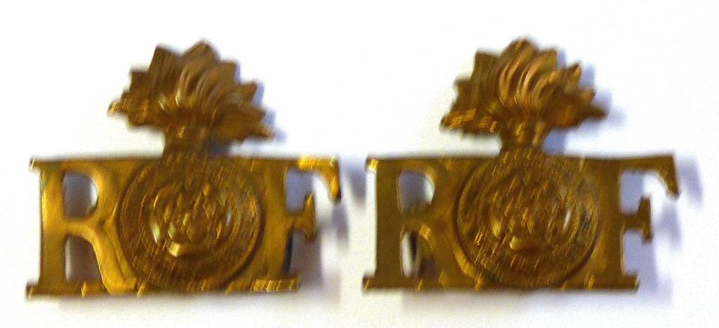 WWI Royal Fusiliers pair of brass shoulder titles (2) GVF+