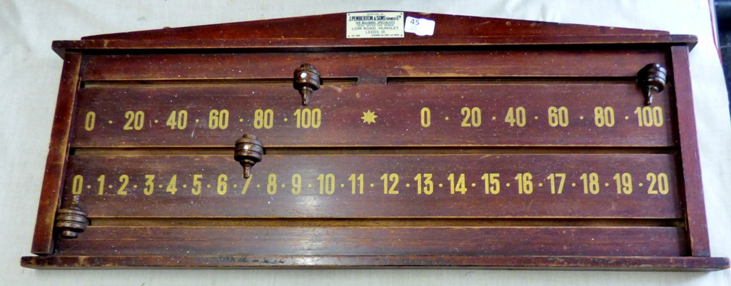 An antique oak and brass score board by J Pemberton + Sons (Sports) Ltd, Leeds -est. 1860