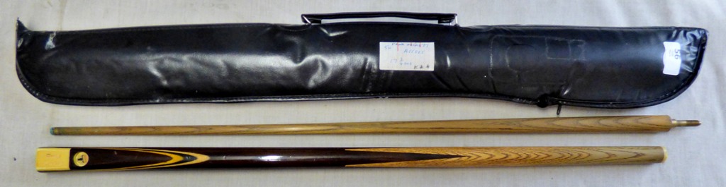 A Taurus Cue and case, reasonable condition