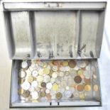 World Coins in Green Money Box – containing a mixture of coins, a few silver.