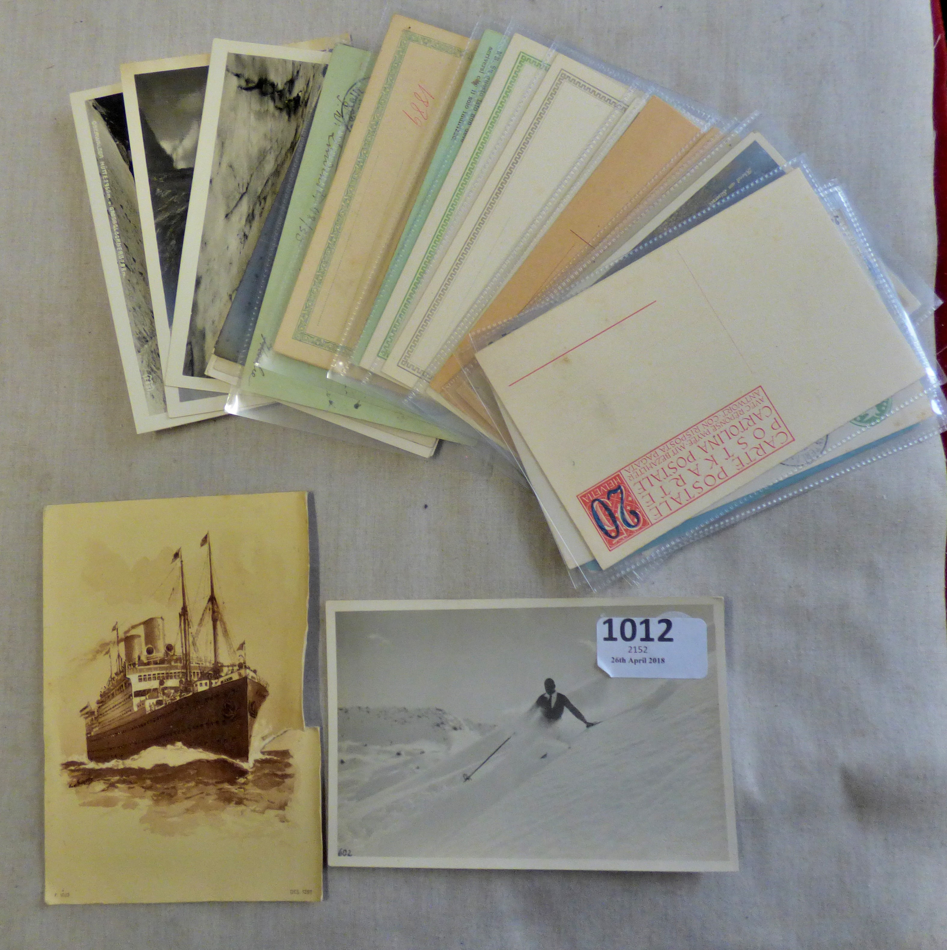 Europe - Early small collection of postal stationary and real photographic postcards including: