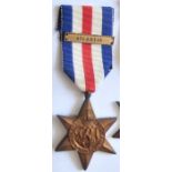 British WWII France and Germany Star with 'Atlantic' clasp, not mounted on ribbon.