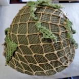 British WWII MKIII 'Turtle' helmet, with camo netting cover