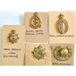 British Collar Badges (5) including: Royal Army Service Corps, Signals, Royal Marines etc.