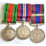 Canadian Volunteer Service medal Trio Circa.1943 with Maple leaf clasp, with Defence medal and The