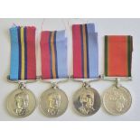 African Medal Selection - An African WWII Service Medal to 572615 H. Rostrum, and (3) Rhodesian G.