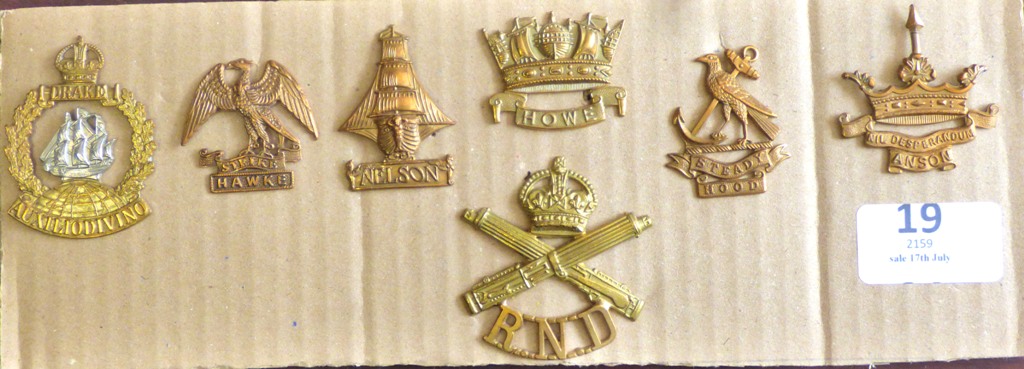 British Royal Navy Cap badges (7) scarce badges, a couple restrikes but a lovely selection. HOWE,