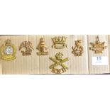 British Royal Navy Cap badges (7) scarce badges, a couple restrikes but a lovely selection. HOWE,