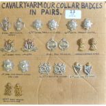British Cavalry and Armoured Corps Collar badge pairs mounted on a board. WWII and Later