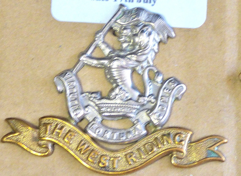 British Modern issue Green Howards XIX Yorkshire Regiment Cap badge. An excellent cap badge (White-