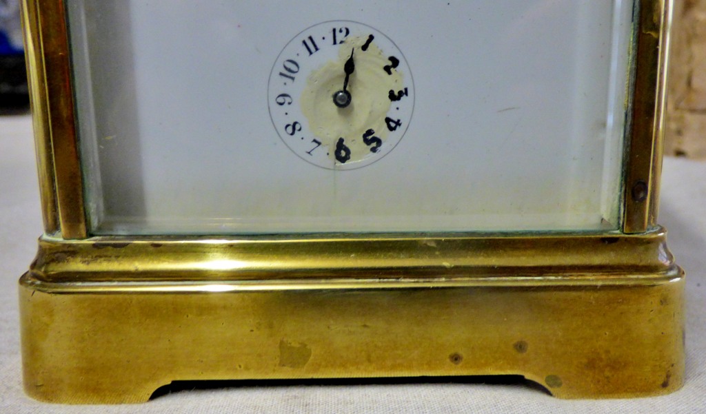 Clock Brass cased carriage clock, unusual movement chiming, in working order, damage to the door and - Image 2 of 5