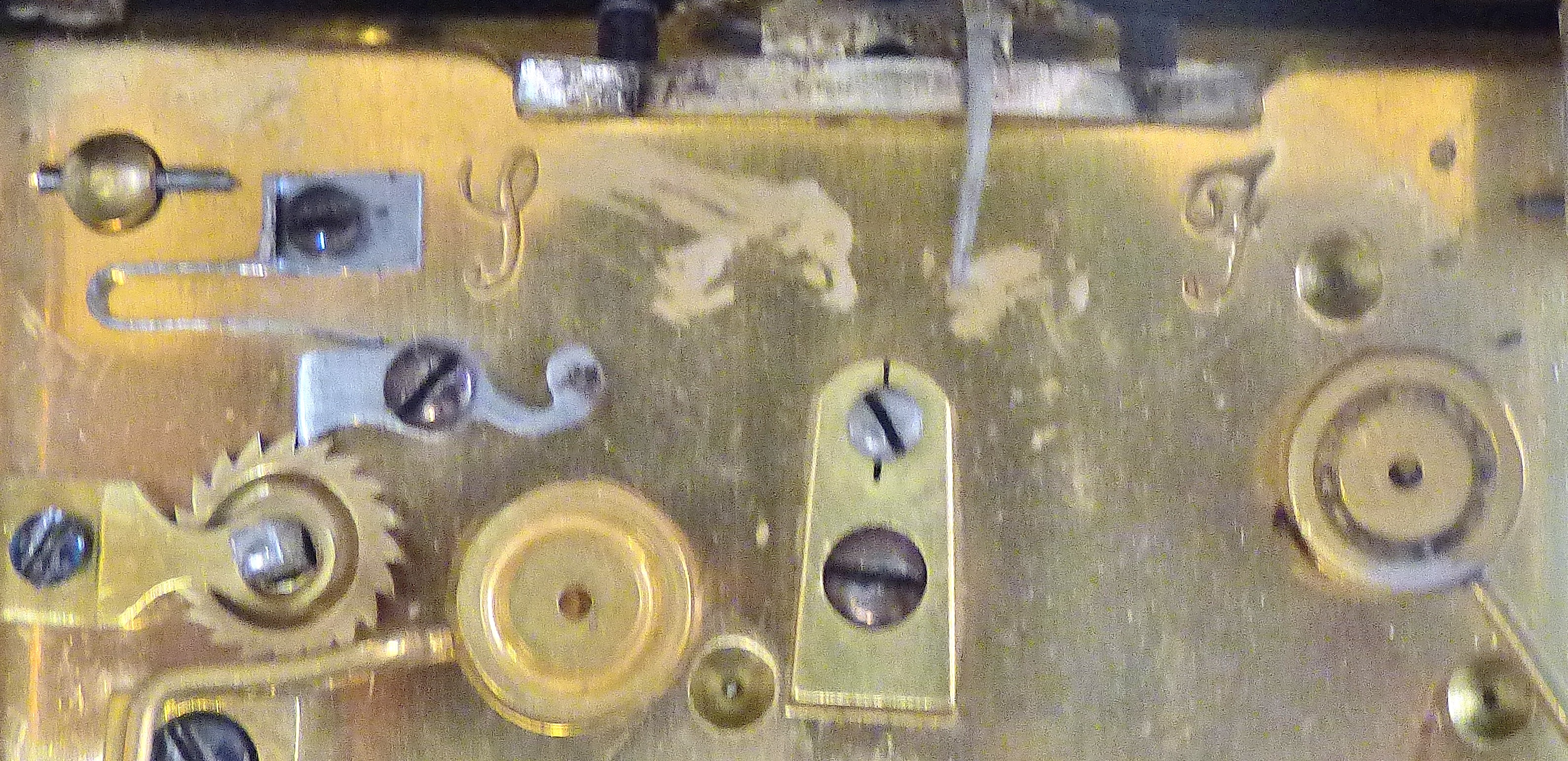 Clock Brass cased carriage clock, unusual movement chiming, in working order, damage to the door and - Image 4 of 5