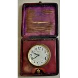 Travel Clock -'Mammoth' Travel Clock in a leather case, in working order dial 5.5cm dial, all