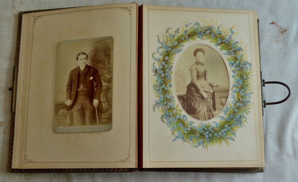 Photograph Album-A large leather - bound album fastened with a brass catch, there is an