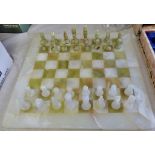 Handmade White and Green Onyx Marble Chess Game Chess Set of Chinese Origin. One white bishop has