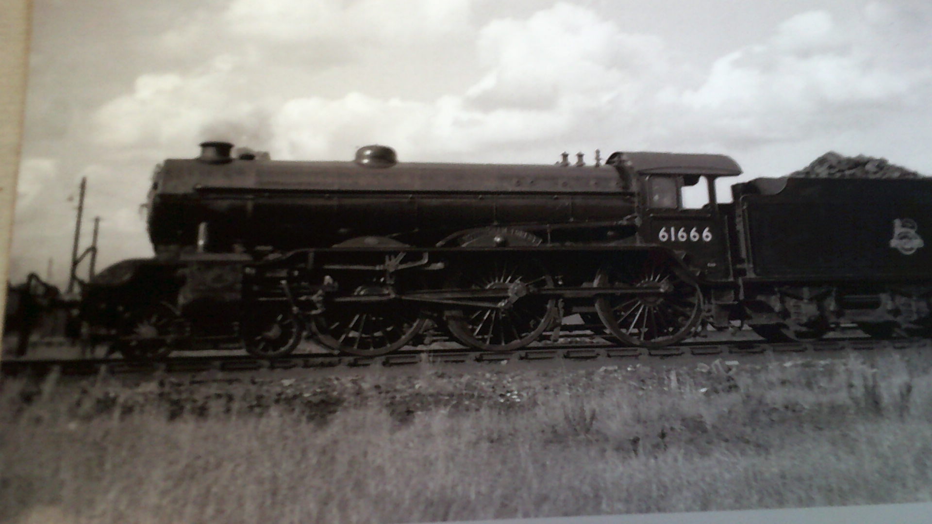 Photograph 12" x 8" black and white - B17/6 4-6-0 61666 Nottingham Forest, stands in the loco yard