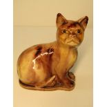 WHIELDON CAT, a brown slip glazed pottery model of a seated cat, 3.