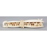 AN EARLY 20TH CENTURY ORIENTAL DOUBLE CLAM'S DREAM IVORY CARVING, 5in wide.