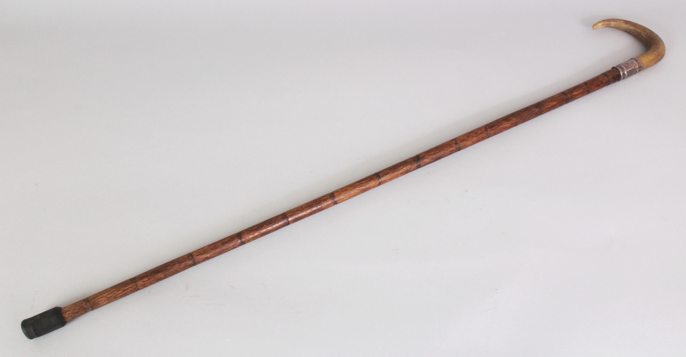 ANOTHER RHINO HORN HANDLED BAMBOO WALKING STICK, with an embossed and hallmarked silver collar, - Image 2 of 5