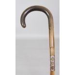 A GOOD QUALITY SECTIONAL HORN WALKING STICK, the stem with an area of pierced silver-metal